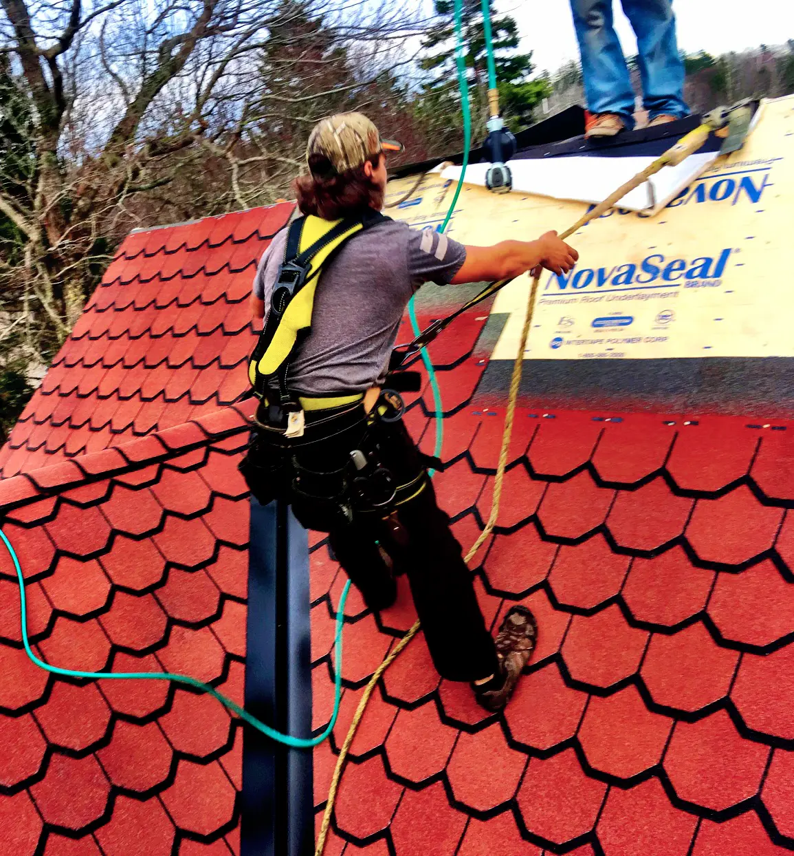roofer installing luxury shingles